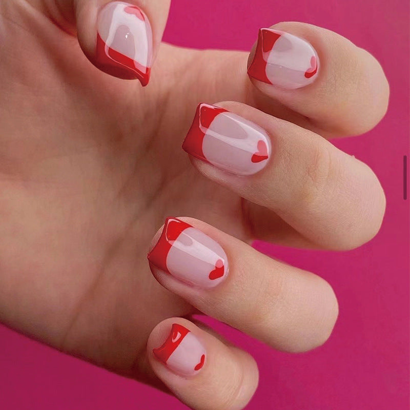 Artistic Nail Extensions with Heart Pattern Stornfield