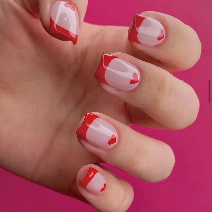 Artistic Nail Extensions with Heart Pattern Stornfield