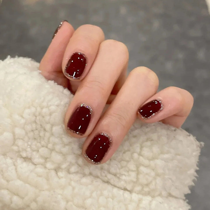 Artificial nails with heart accent and glamorous decorations Stornfield