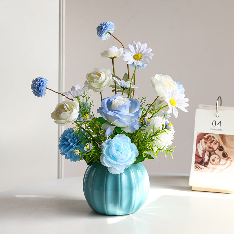 Lifelike Floral Arrangement in Decorative Ceramic Vase