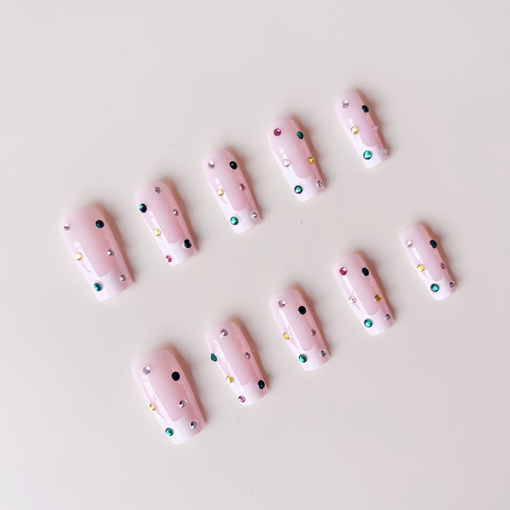 Artificial nail set with sparkling rhinestone accents and elegant details Stornfield