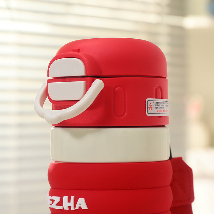Women's Insulated Bottle with Playful Design and Practical Carry Handle Stornfield