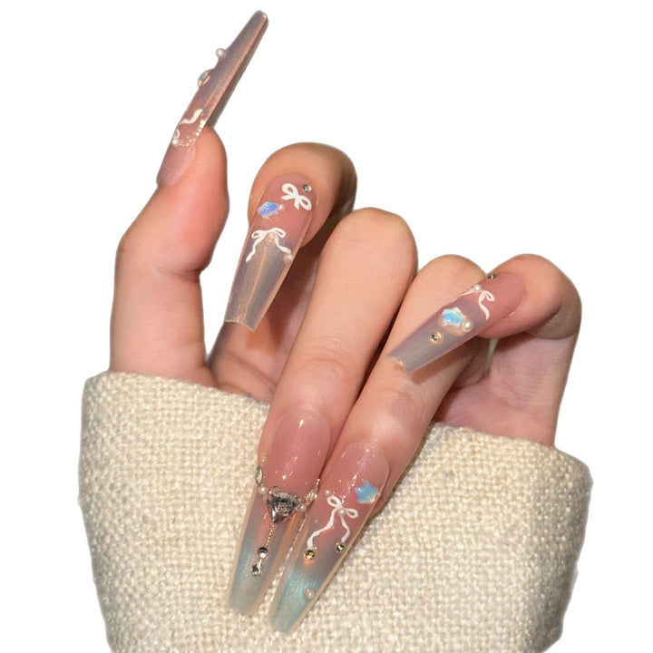 Elegant Press-On Nail Art Set with Chic Ribbon and Gem Accents Stornfield