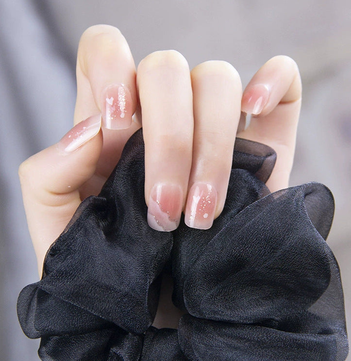 Elegant nail design with pearl embellishment Stornfield