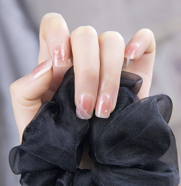 Elegant nail design with pearl embellishment Stornfield