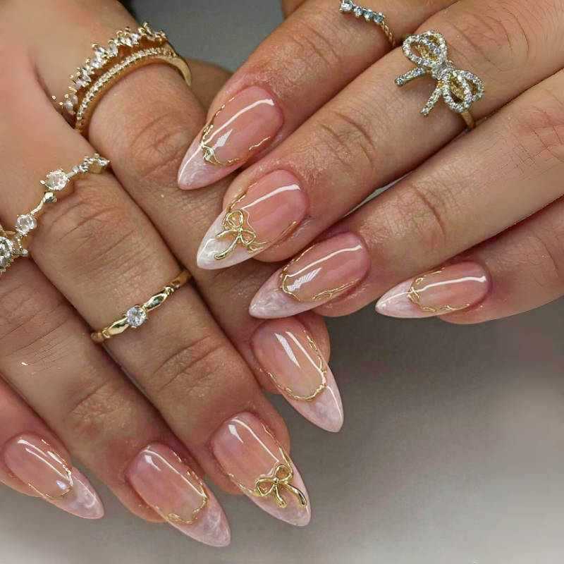 Artistic Pointed Press-On Nails with Gold Accents Stornfield