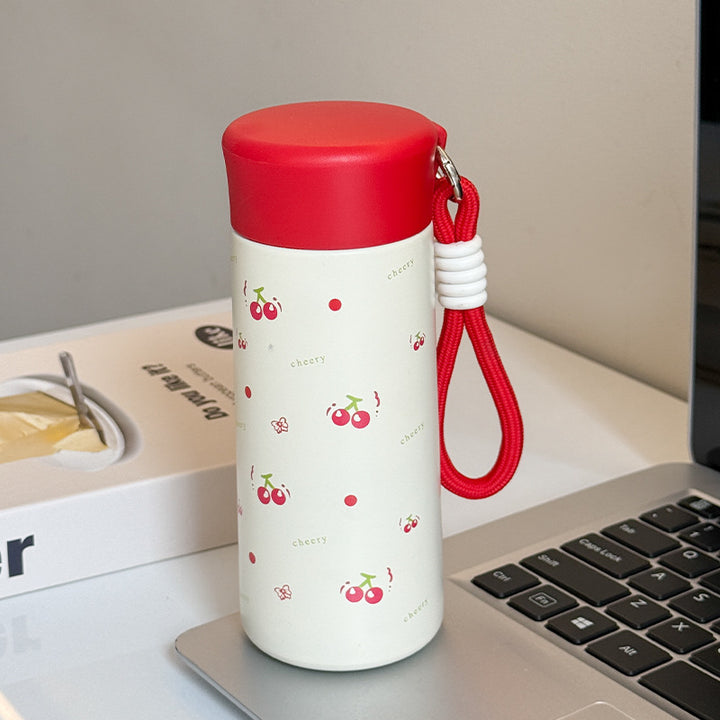 Women’s insulated drinking bottle with practical carrying strap and playful design Stornfield