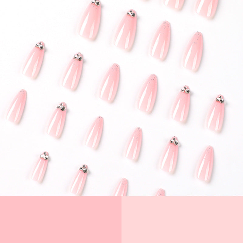 Elegant Nail Art with Glitter and Rhinestone Decorations Stornfield