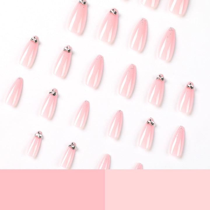 Elegant Nail Art with Glitter and Rhinestone Decorations Stornfield