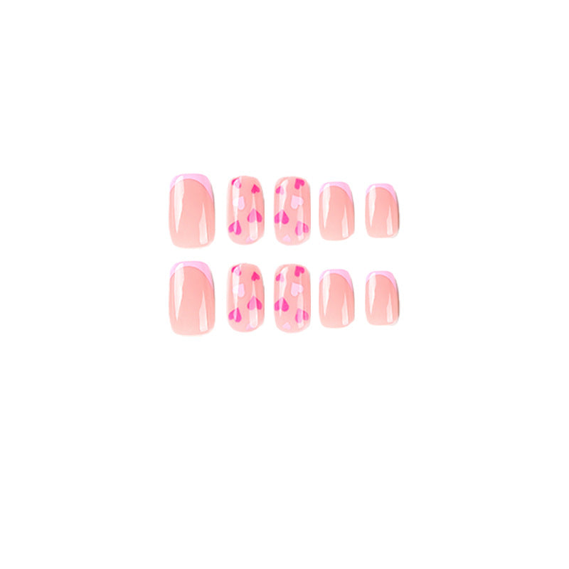 Elegant Nail Art with Heart Motifs Stornfield