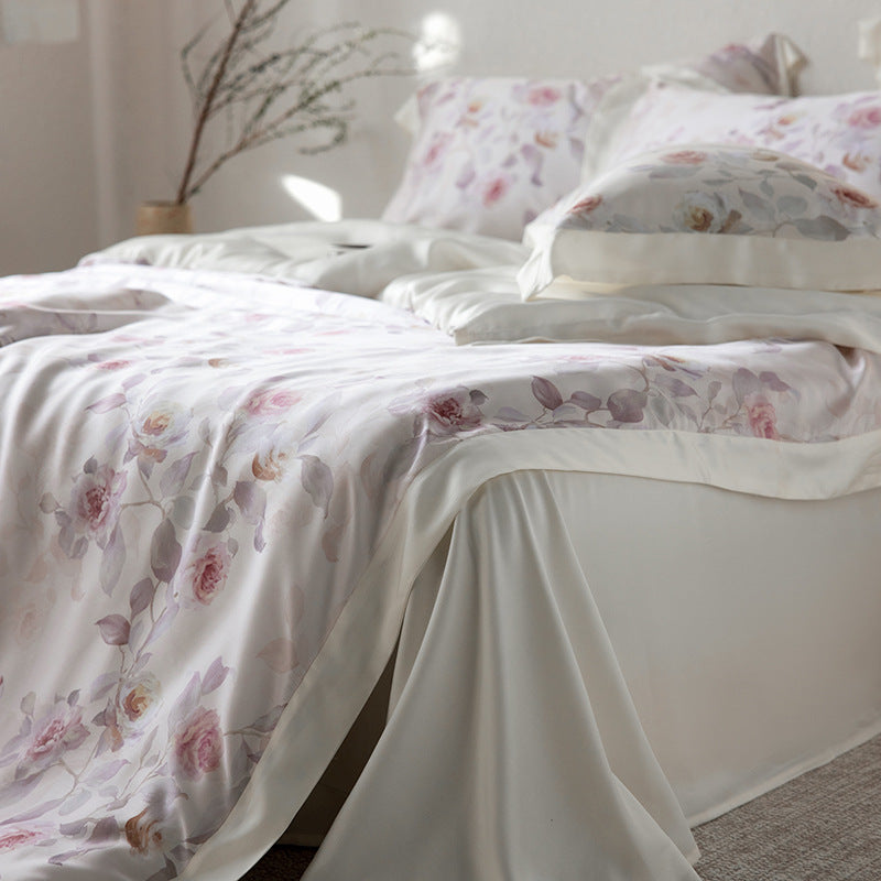 Reversible satin bedding set with floral watercolor print and silky matte surface