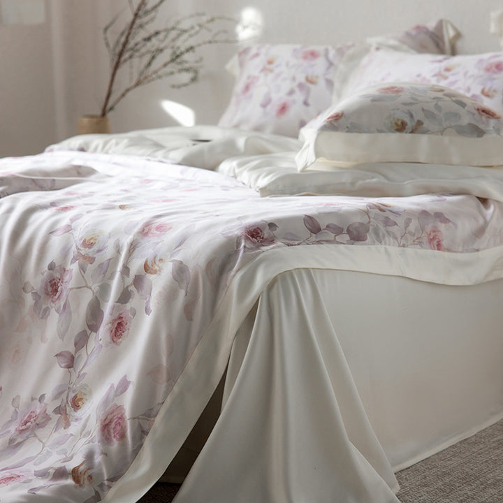 Reversible satin bedding set with floral watercolor print and silky matte surface
