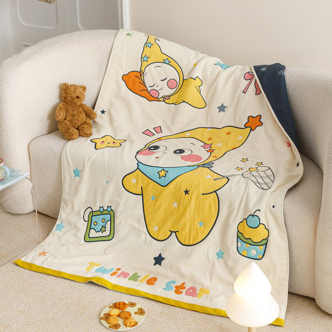 Kids' cuddly blanket with cheerful vehicle print made of soft microfibre