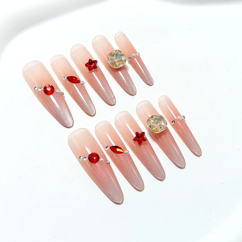 Sparkling artificial nails with decorative rhinestones Stornfield