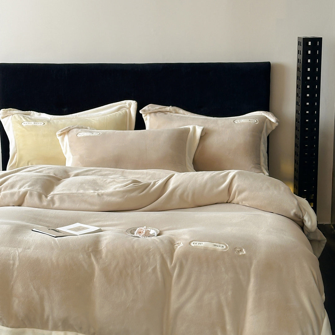 Luxurious velvet bedding set with plush cover, satin edge, and decorative embroidery