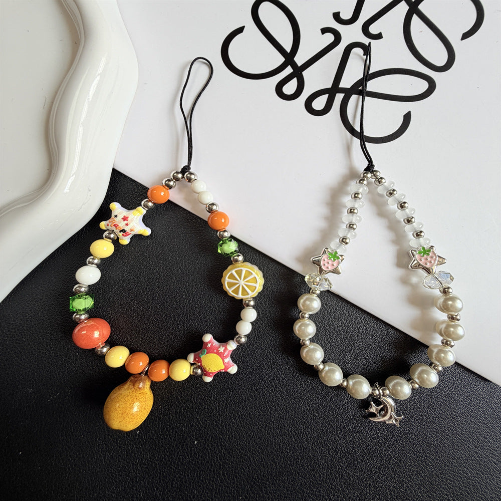 Playful Pearl and Charm Exaggerated Necklace Stornfield