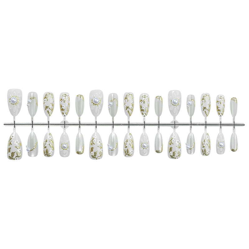 Artificial nail set with elegant flower and pearl decorations Stornfield