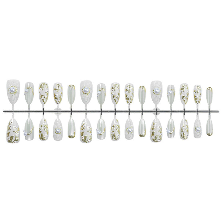 Artificial nail set with elegant flower and pearl decorations Stornfield