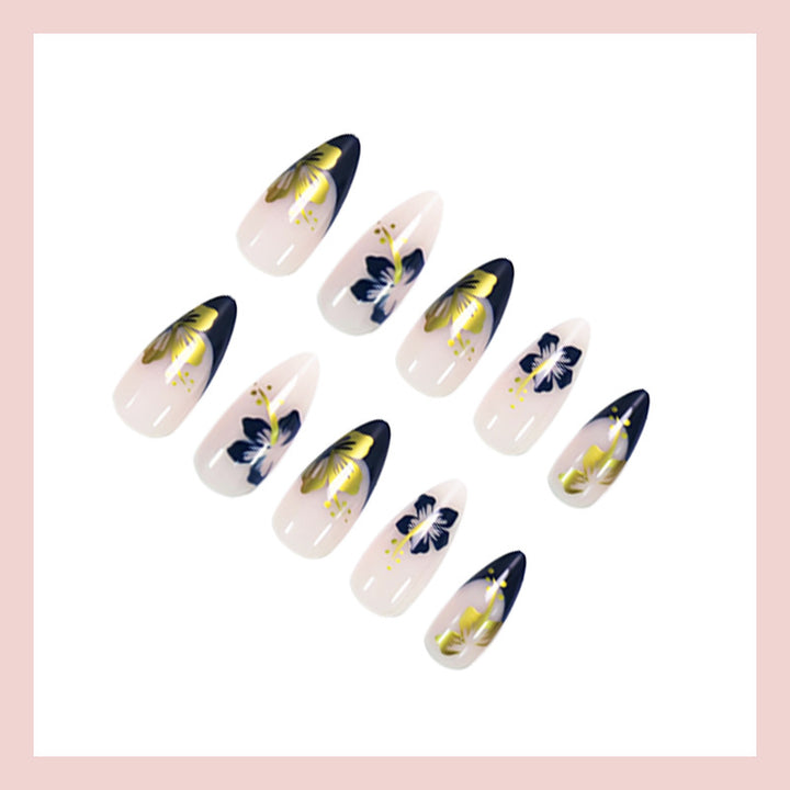 Acrylic nail set with unique flower and gold decorations Stornfield