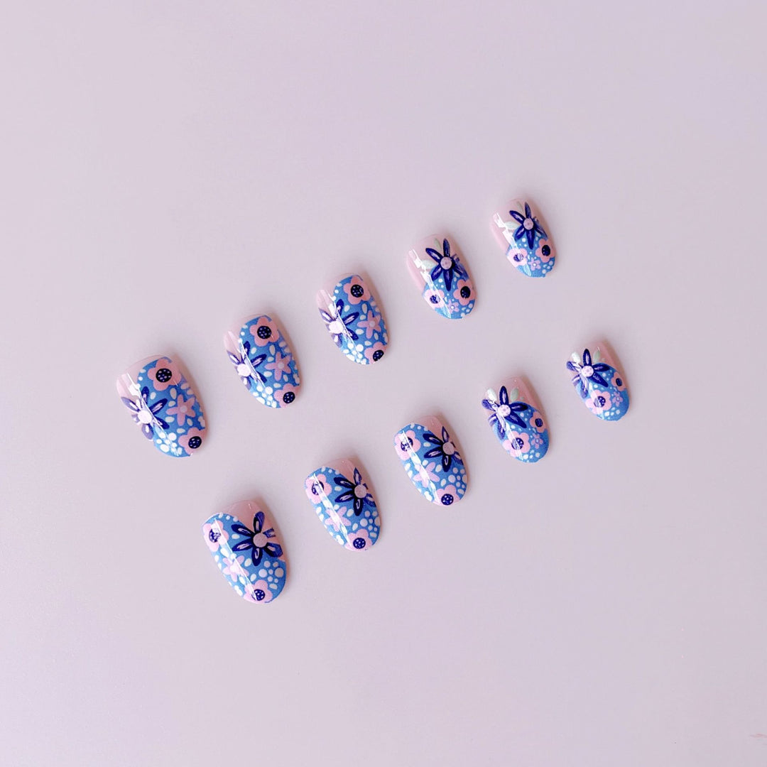 Nail art set with floral accents and vibrant patterns Stornfield