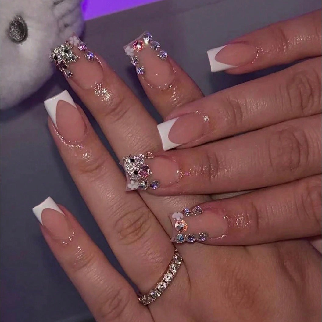 Artificial nail set with stylish rhinestone decorations Stornfield