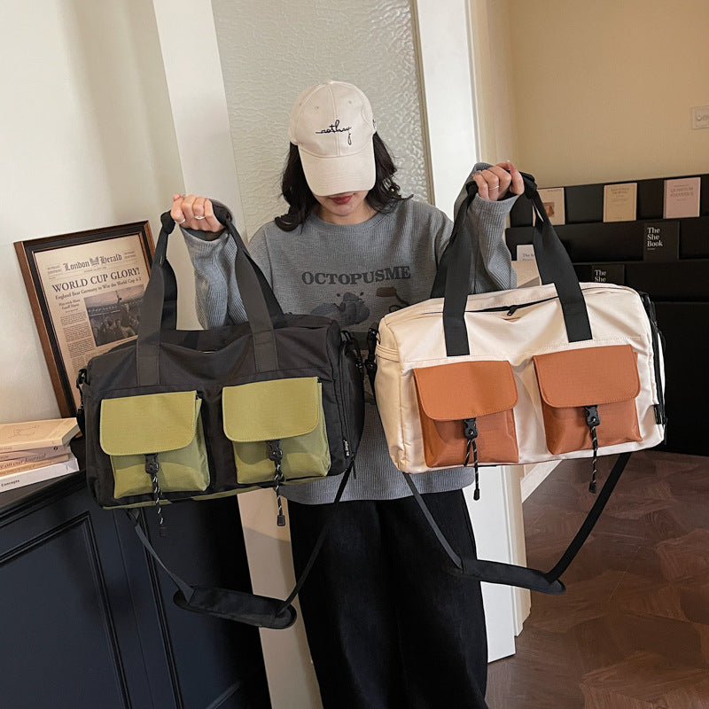 Multifunctional tote bag with comfortable shoulder padding and numerous outer pockets Stornfield