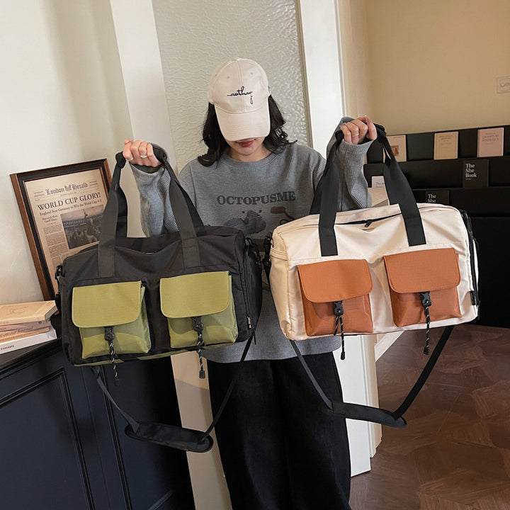 Multifunctional tote bag with comfortable shoulder padding and numerous outer pockets Stornfield