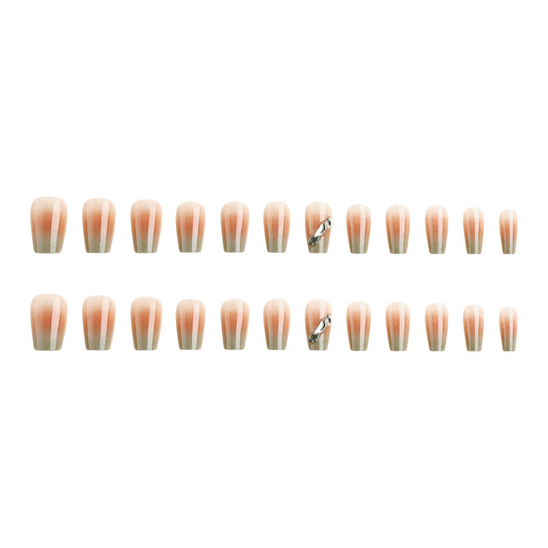 Artificial nail set with elegant ombre design and sparkling applications Stornfield