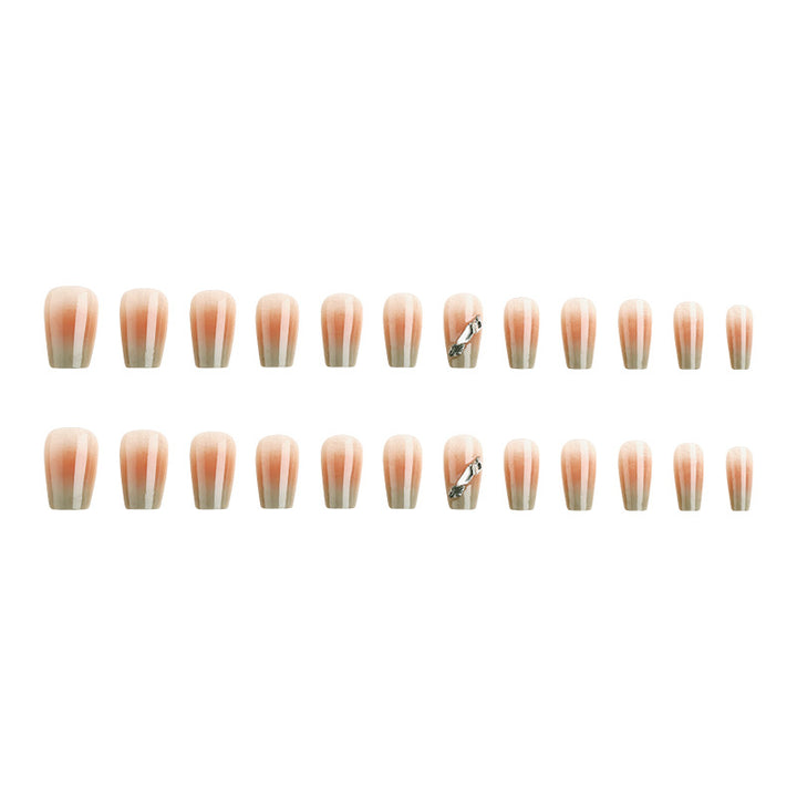 Artificial nail set with elegant ombre design and sparkling applications Stornfield