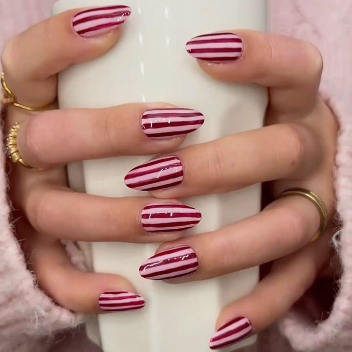 Artistic nail art with striped design Stornfield