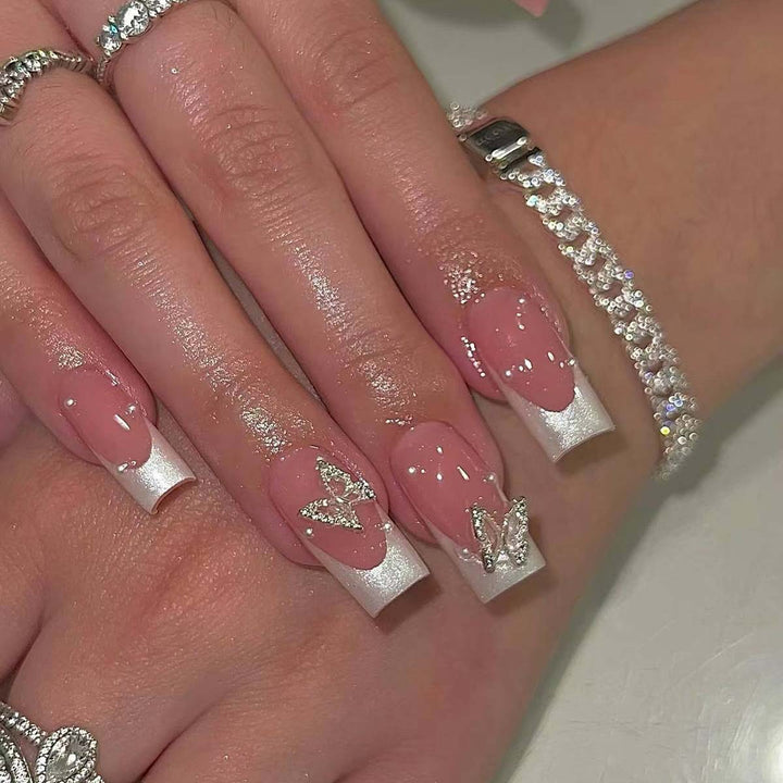 Creative French nails with glitter accents Stornfield