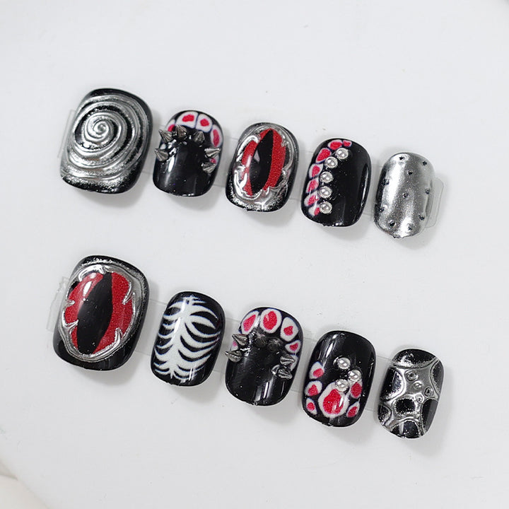 Artificial nail set with creative patterns and glamorous details Stornfield