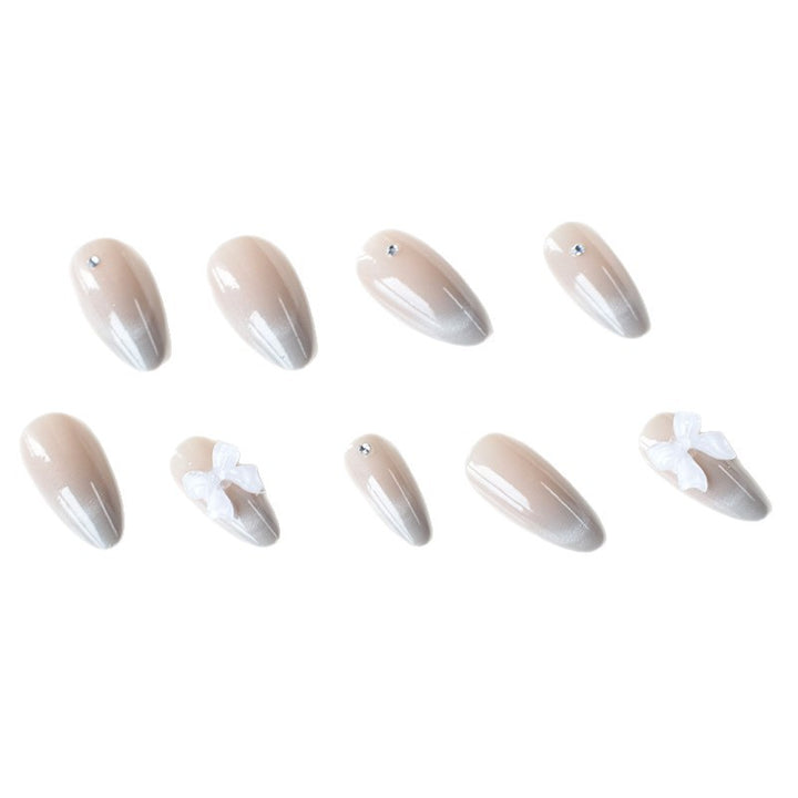 Elegant Rhinestone and Bow Nail Art Extensions Stornfield