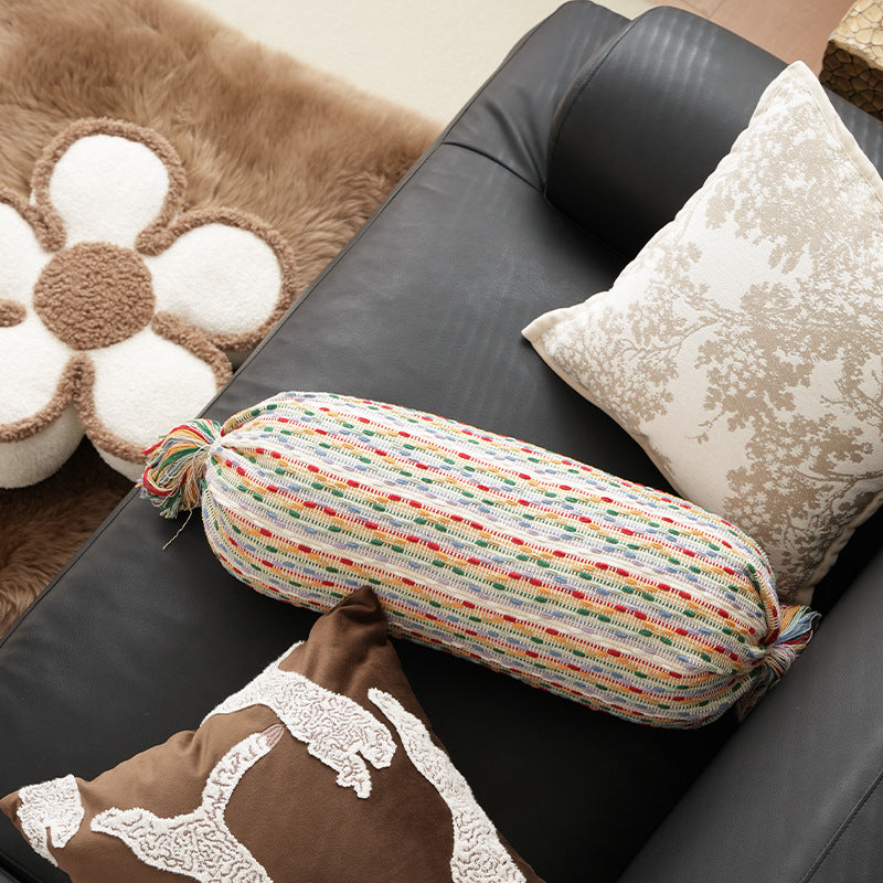 Cozy cushion set made of woven cotton blend with cylindrical roll and tassels Stornfield