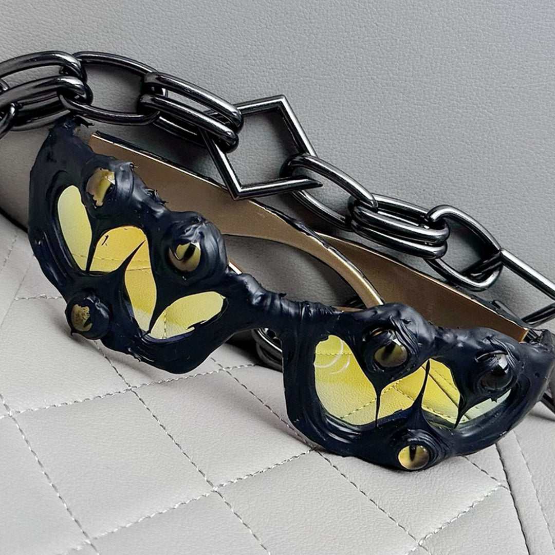 Ladies extravagant sunglasses with unique frame and eye-catching detail Stornfield