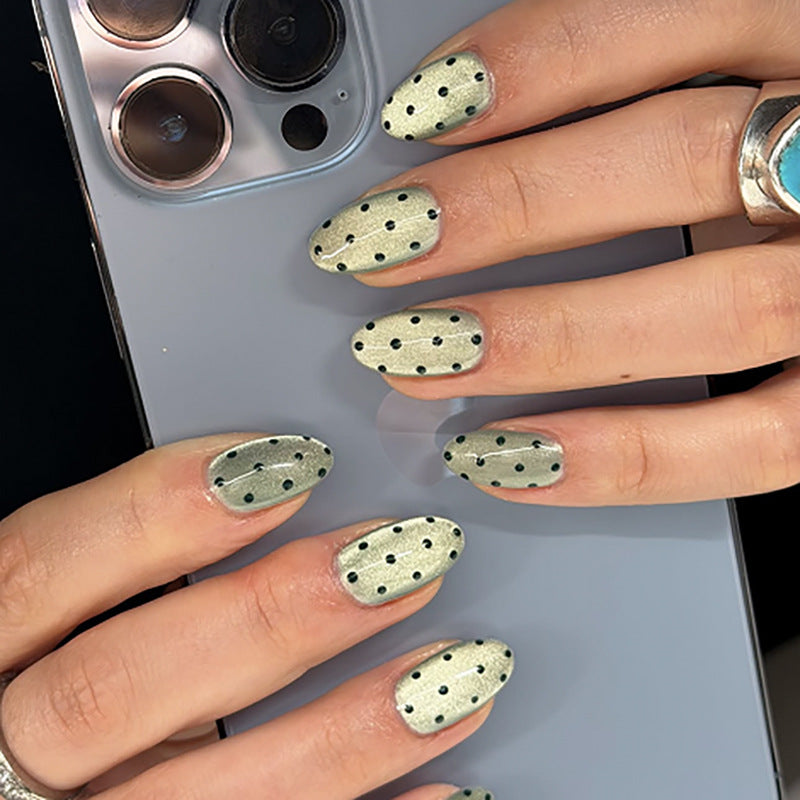 Creative Nail Art with Polka Dot Pattern Stornfield