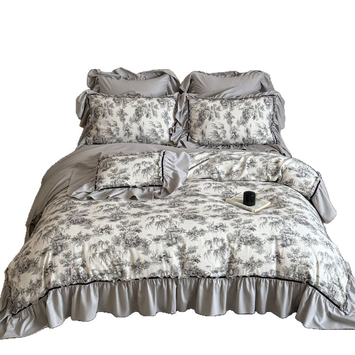Bedding set with ruffles and toile pattern