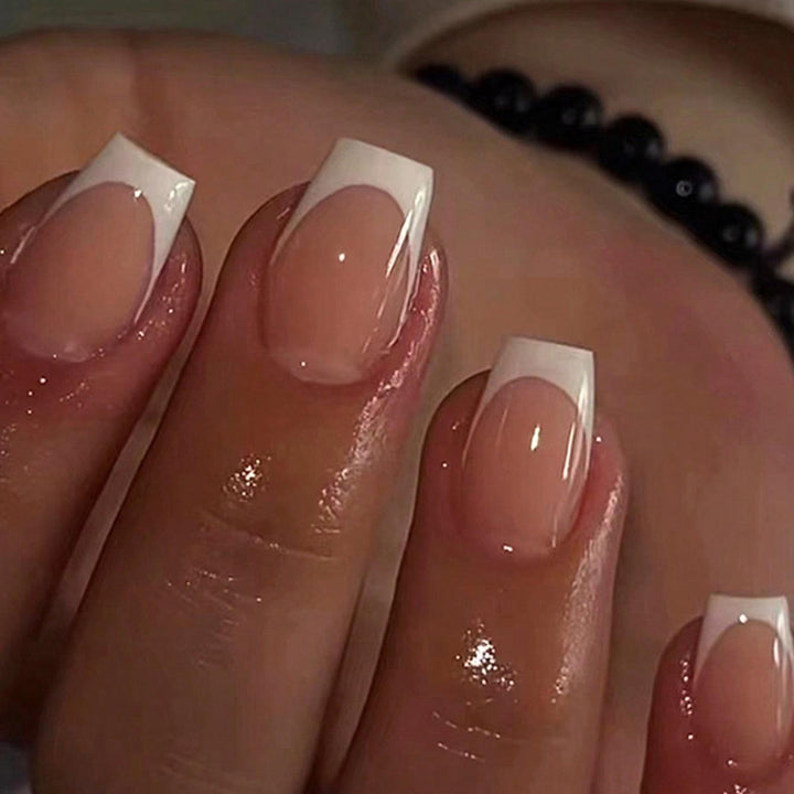 Artificial nails in elegant French style Stornfield