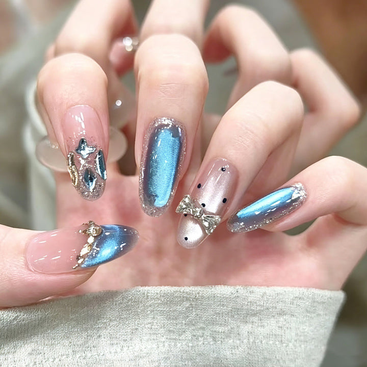 Art nails in elegant premium design with rhinestone and glitter elements Stornfield