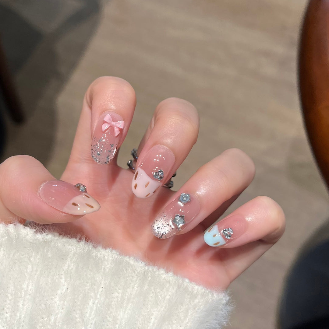 Elegant Nail Art Extensions with Pearl Accents Stornfield