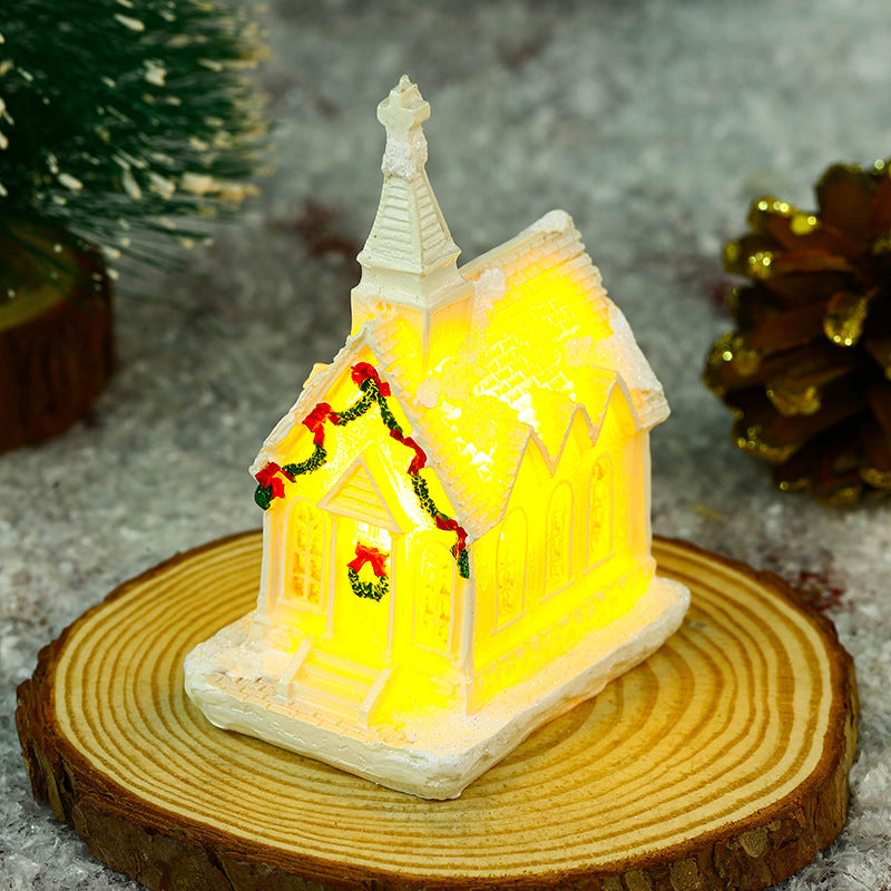 Illuminated Christmas village house with festive decoration Stornfield