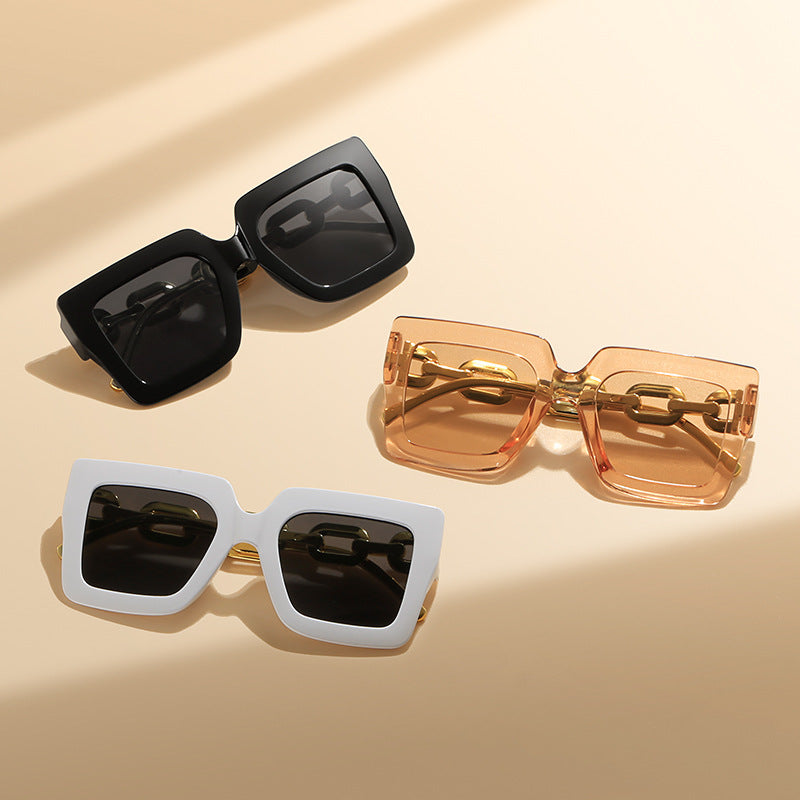 Women's fashionable sunglasses with unique rectangular frame and chain details Stornfield
