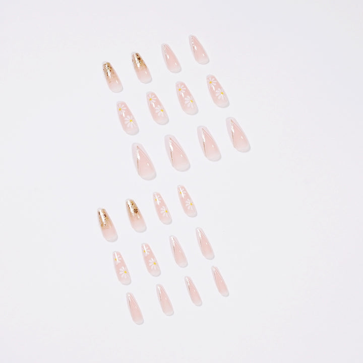 Artful nail extensions with floral designs and glitter accents Stornfield