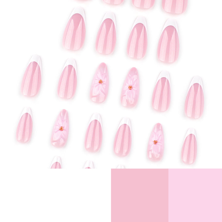 Artistic French-Tip Nail Extensions with Flower Accents Stornfield