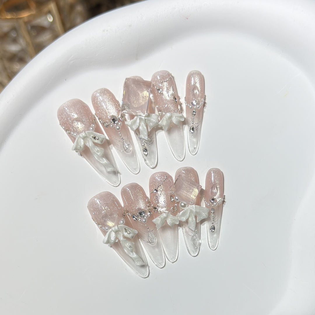 Elegant Press-On Acrylic Nail Set with Decorative Bow and Glitter Accents Stornfield