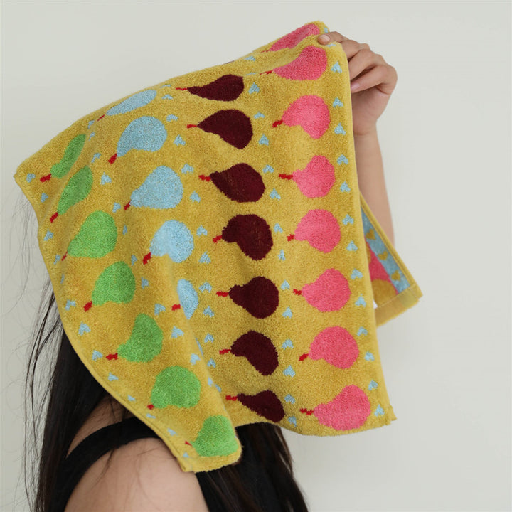 Jacquard guest towel made of cotton terry with playful bird and heart pattern