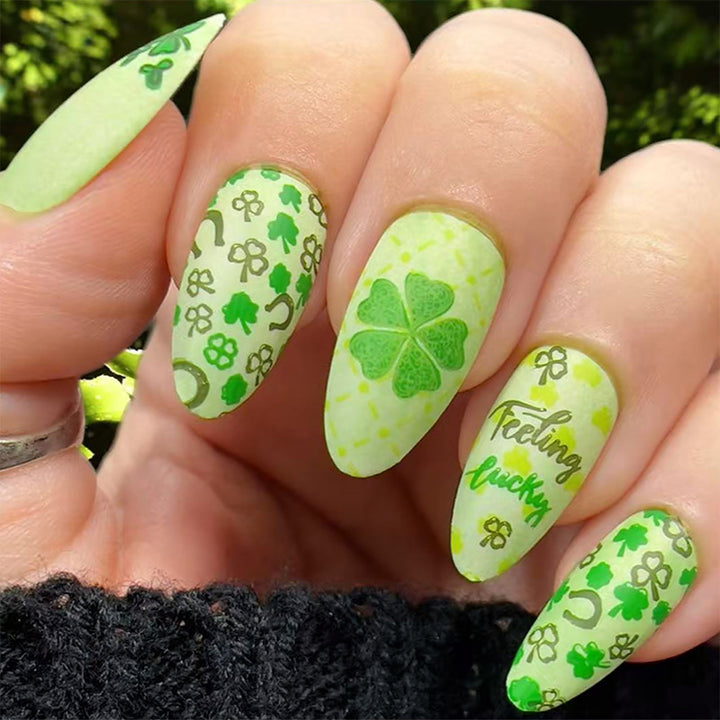 Art nail set with cheerful clover designs and casual lettering motifs Stornfield