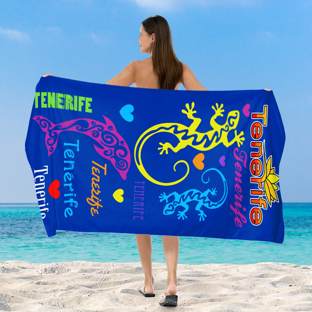 Beach towel with vibrant, colorful animal motif Stornfield