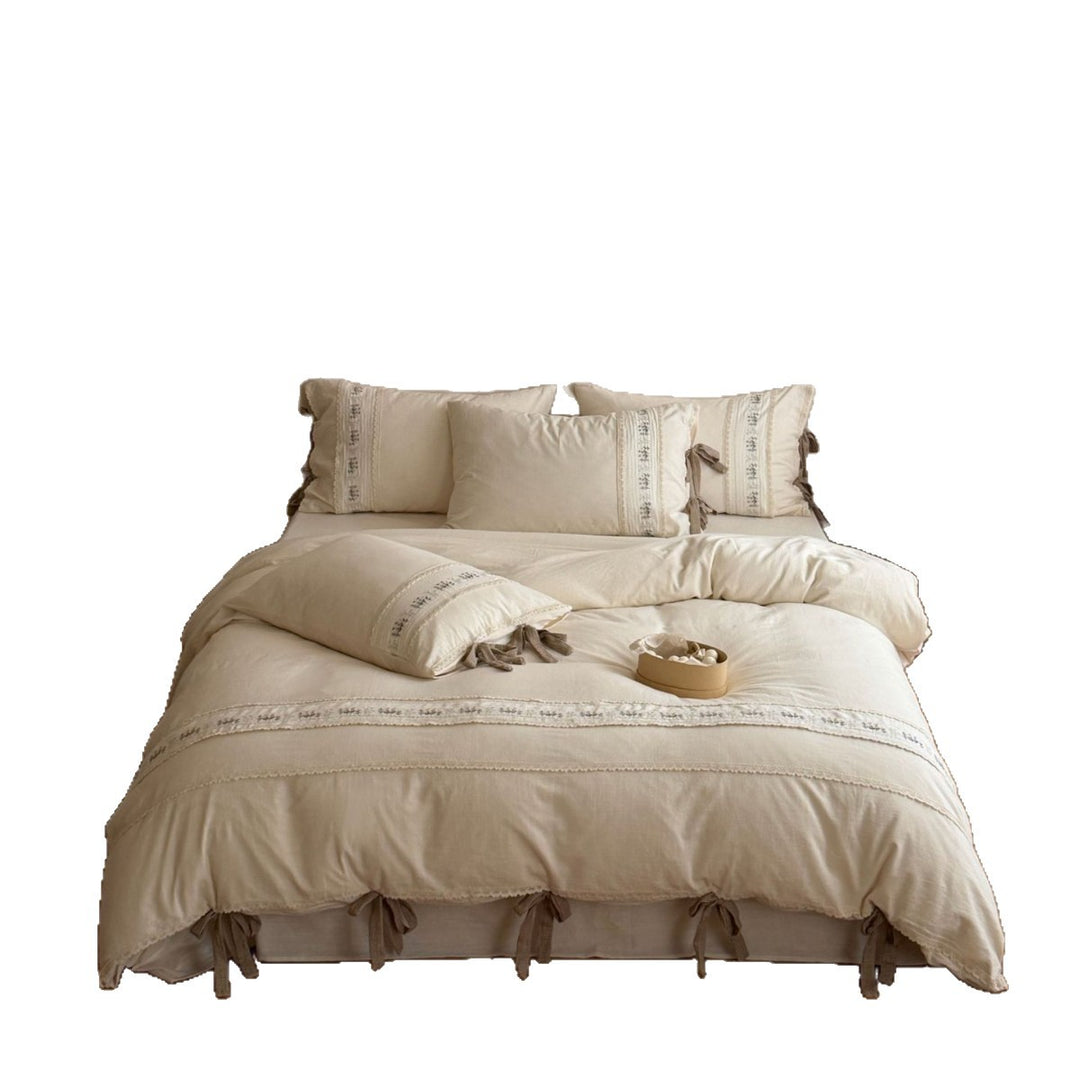 Luxurious cotton bedding set with floral embroidery and lace trim