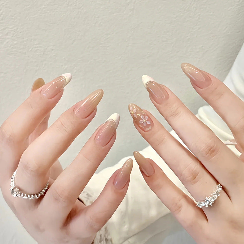 Artificial nails with sweet animal motifs and elegant French tip design Stornfield